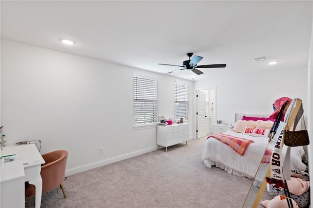 bedroom featuring recessed lighting, light colored carpet, ceiling fan, baseboards, and visible vents