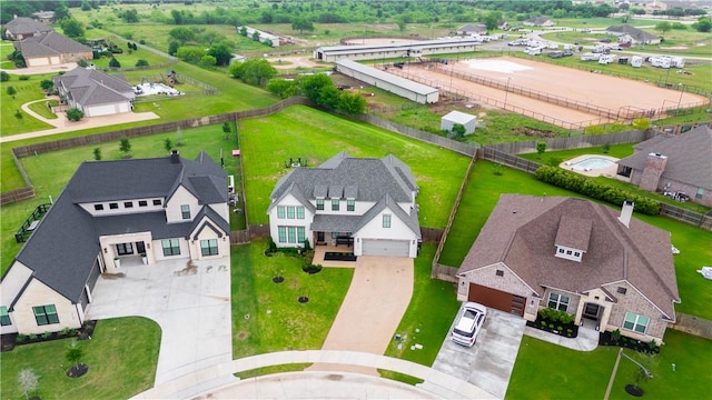 birds eye view of property with a residential view