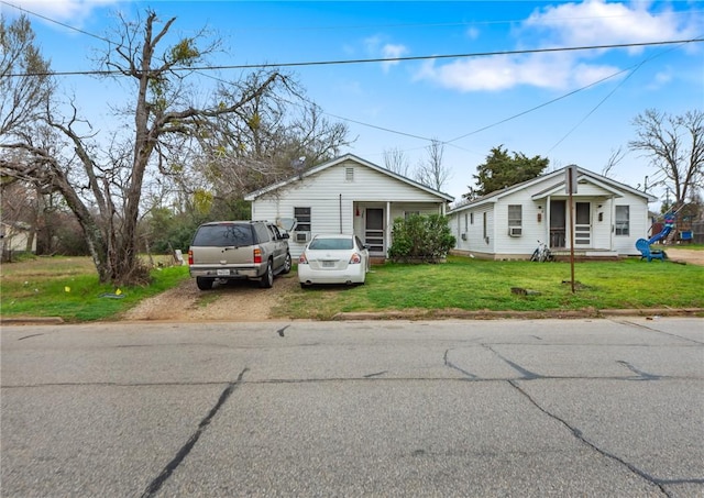 view of front of property with a front lawn