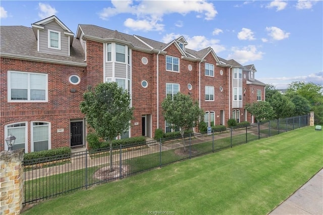 view of property with a front yard