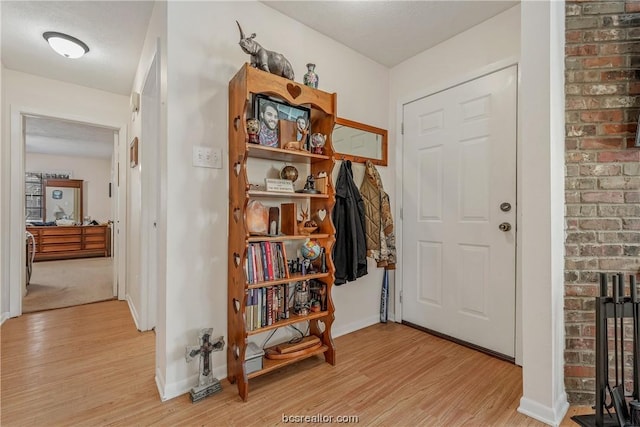 foyer entrance featuring light wood-type flooring