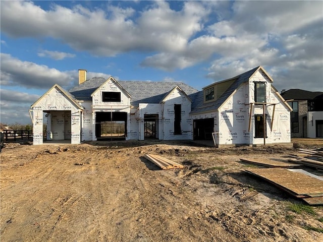 property in mid-construction with a garage