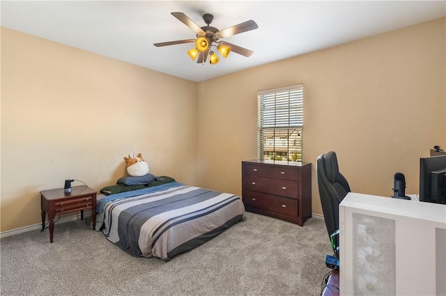 bedroom featuring light carpet and ceiling fan