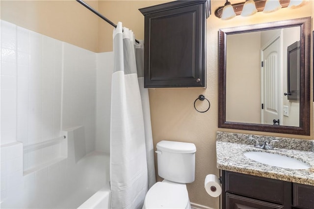 full bathroom featuring vanity, shower / bathtub combination with curtain, and toilet