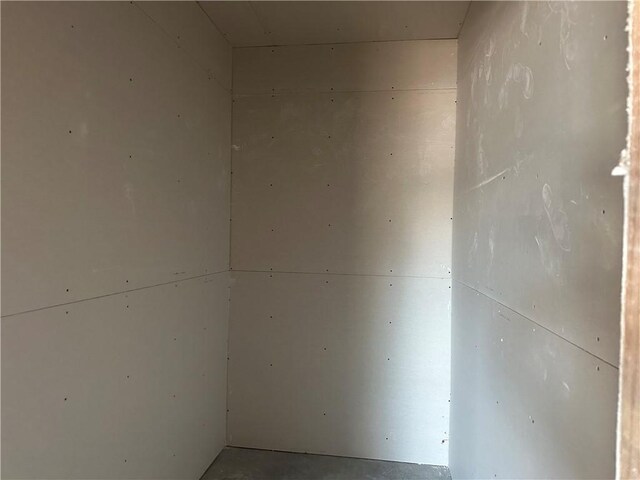 4111 Marsh St, Bryan, TX 77803 - spare room with concrete floors
