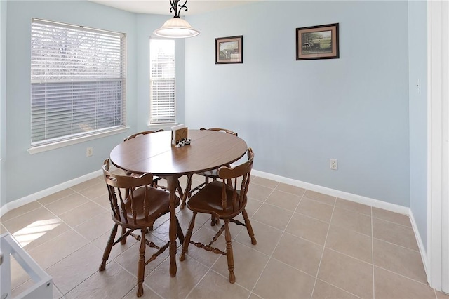 view of tiled dining space