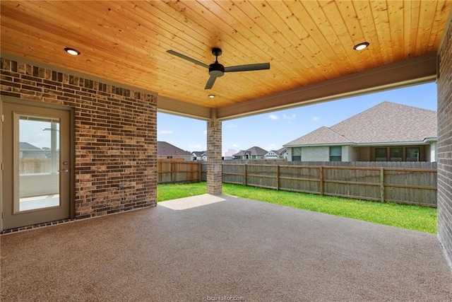 view of patio featuring ceiling fan