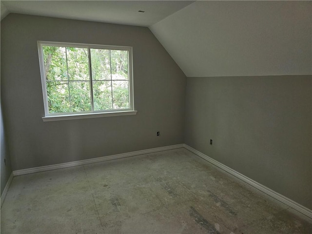 1112 Justine, Bryan, TX 77803 - additional living space featuring vaulted ceiling