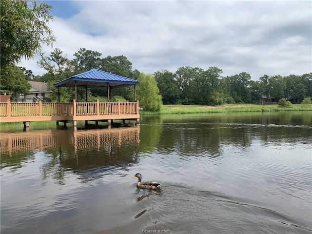 dock area featuring a gazebo and a water view