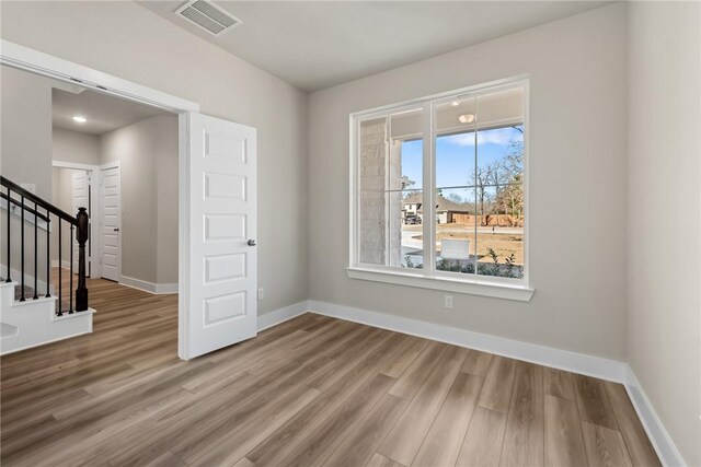 bathroom with tile patterned flooring, shower with separate bathtub, and a wealth of natural light