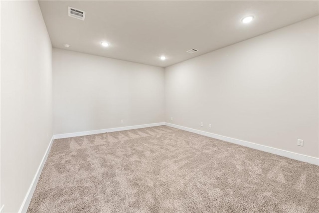 empty room featuring carpet floors