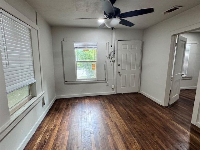 interior space featuring dark hardwood / wood-style floors and ceiling fan