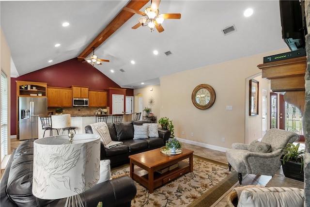 living area with a ceiling fan, visible vents, beam ceiling, and baseboards