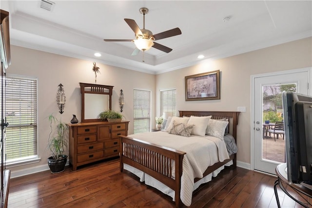 bedroom with dark wood-type flooring, access to exterior, baseboards, visible vents, and crown molding