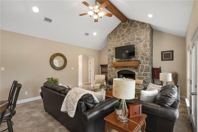 living area featuring visible vents, arched walkways, a fireplace, a ceiling fan, and vaulted ceiling with beams