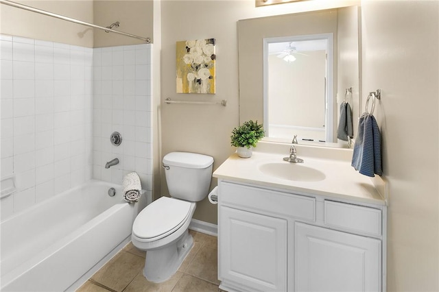 full bathroom featuring toilet, ceiling fan, tile patterned flooring, bathtub / shower combination, and vanity