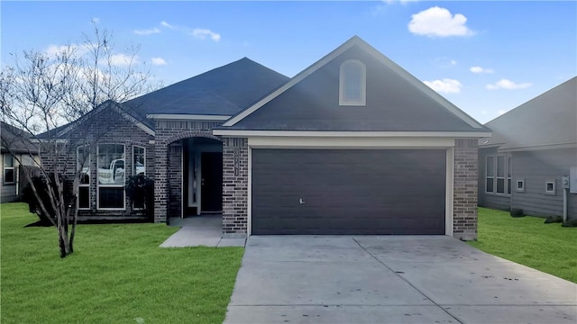 view of front facade with a garage and a front lawn