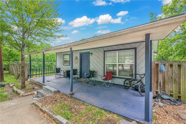 view of patio / terrace with fence