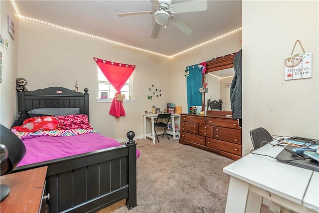 bedroom featuring ceiling fan and carpet floors