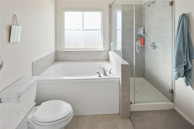 bathroom with separate shower and tub and toilet