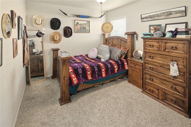 bedroom with light carpet