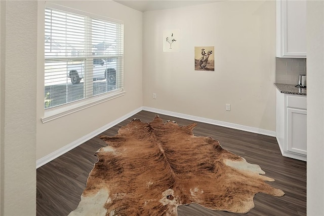 dining area with dark wood-type flooring