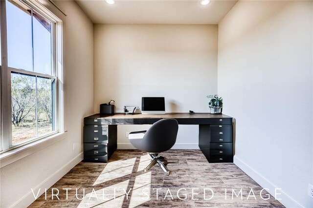 office area with hardwood / wood-style flooring