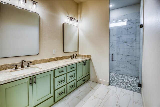 bathroom featuring vanity and a shower with door