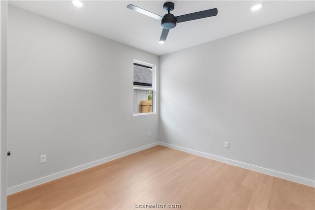 empty room featuring ceiling fan and wood-type flooring