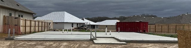 exterior space with a fenced backyard