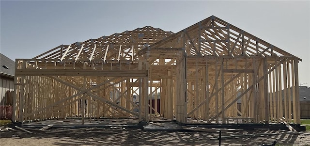 view of gate featuring an outdoor structure