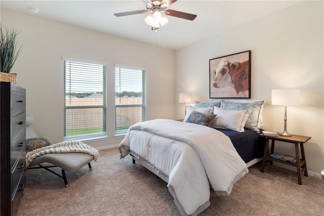 5308 Lyle Pl, Bryan, TX 77807 - bedroom featuring light colored carpet, a ceiling fan, and baseboards
