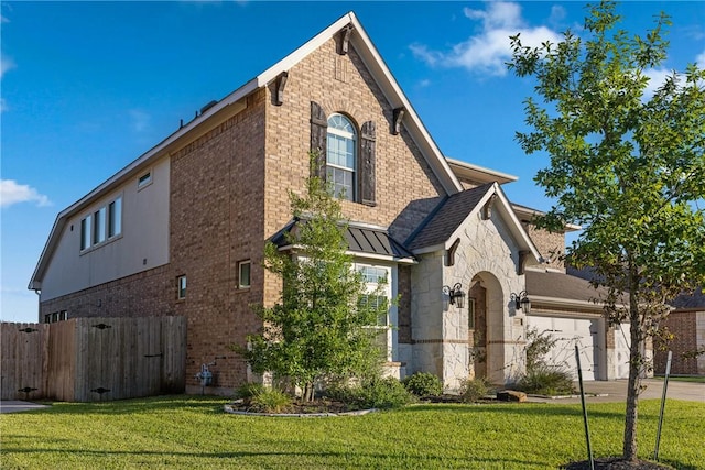 view of property exterior featuring a yard and a garage