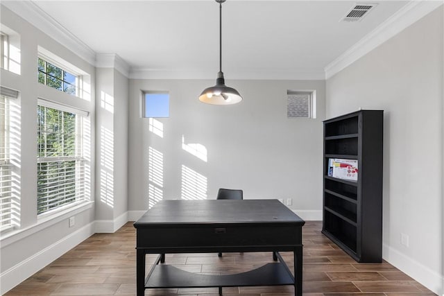 office area with dark hardwood / wood-style floors and crown molding