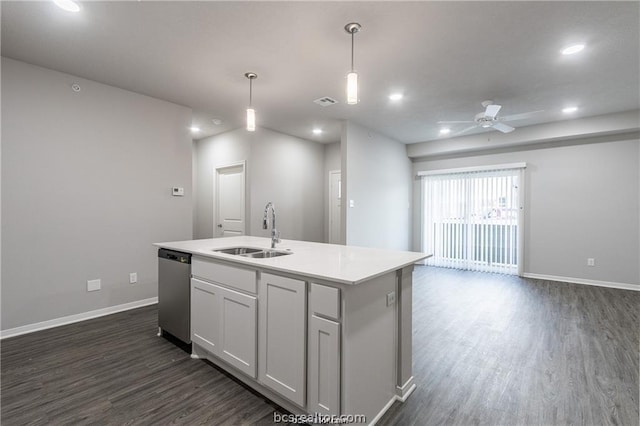 kitchen with sink, stainless steel dishwasher, decorative light fixtures, a kitchen island with sink, and white cabinets