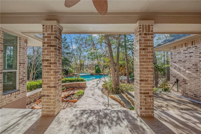 view of patio with ceiling fan