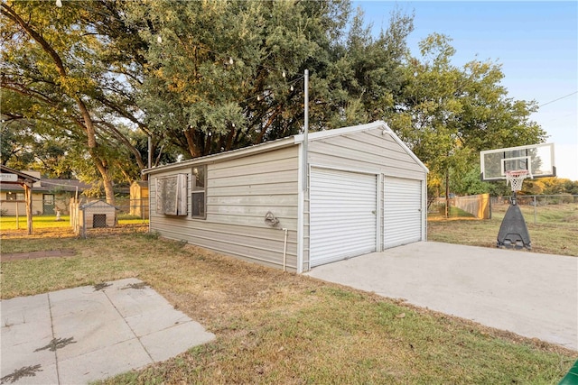 garage featuring a yard