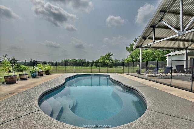 view of pool featuring a patio area