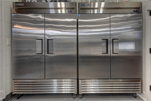 room details featuring stainless steel built in refrigerator and high end refrigerator