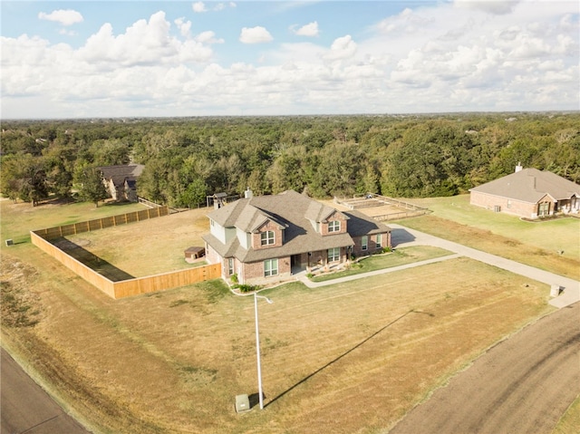 18214 Retriever Run, College Station, TX 77845 - aerial view of property and surrounding area with a heavily wooded area