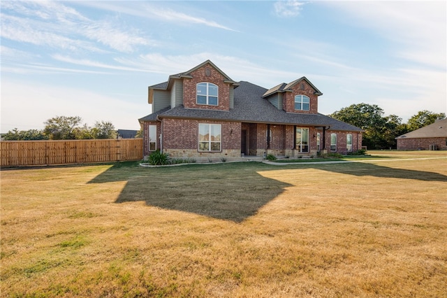 18214 Retriever Run, College Station, TX 77845 - traditional-style home with brick siding and a shingled roof