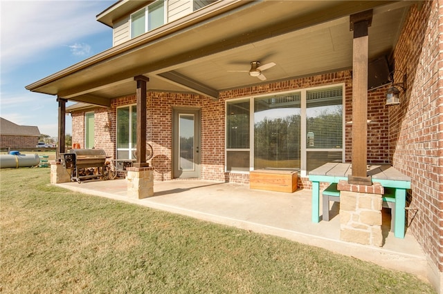 view of patio / terrace with a grill and ceiling fan