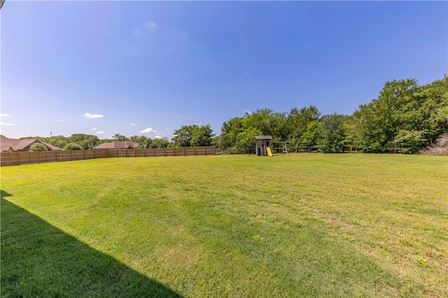 18214 Retriever Run, College Station, TX 77845 - view of yard with a playground