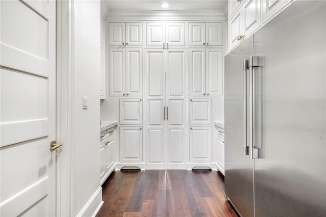 spacious closet with dark wood-type flooring