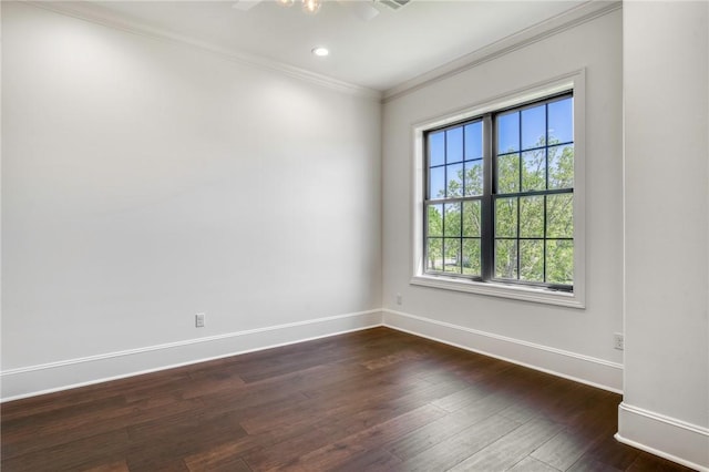 spare room featuring baseboards, ornamental molding, recessed lighting, dark wood finished floors, and ceiling fan