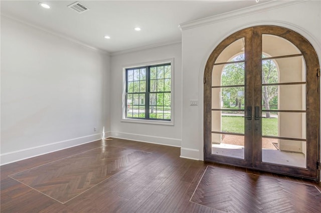 entryway with visible vents, baseboards, crown molding, recessed lighting, and french doors