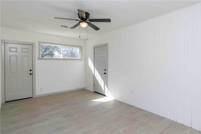 entrance foyer featuring ceiling fan