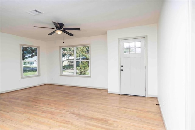 foyer entrance featuring light hardwood / wood-style flooring and ceiling fan