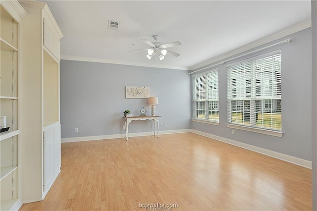 801 Luther St W Unit 407, College Station, TX 77840 - spare room with a ceiling fan, light wood finished floors, and ornamental molding