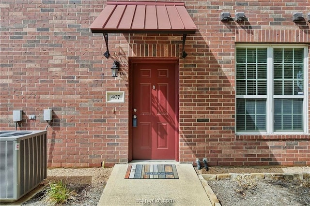 801 Luther St W Unit 407, College Station, TX 77840 - view of exterior entry with brick siding